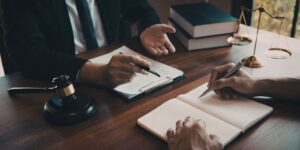 business owner meeting with their business lawyer