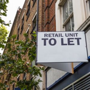 sign outside building that says “Retail unit to let”